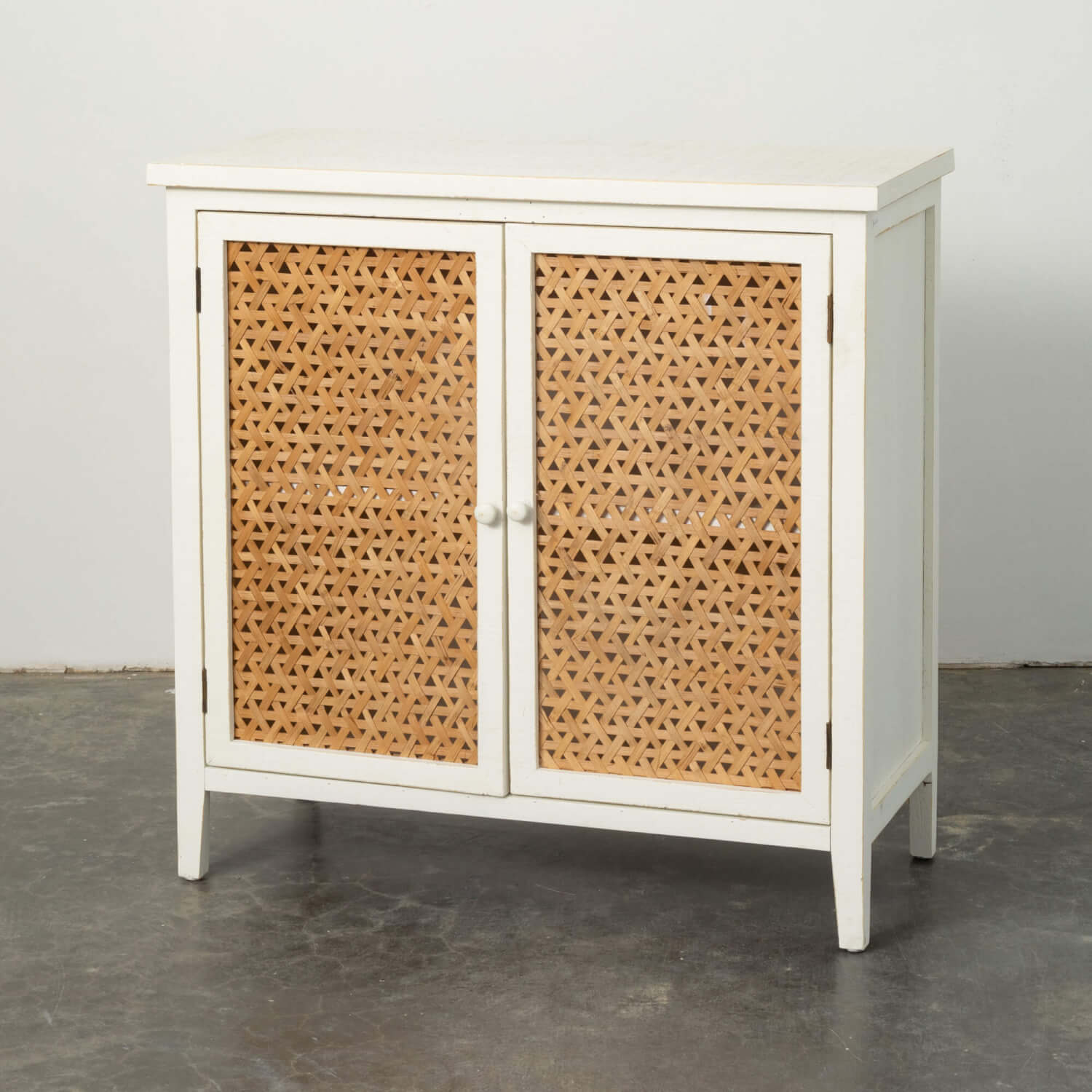 CABINET WITH WEAVED REED INSET