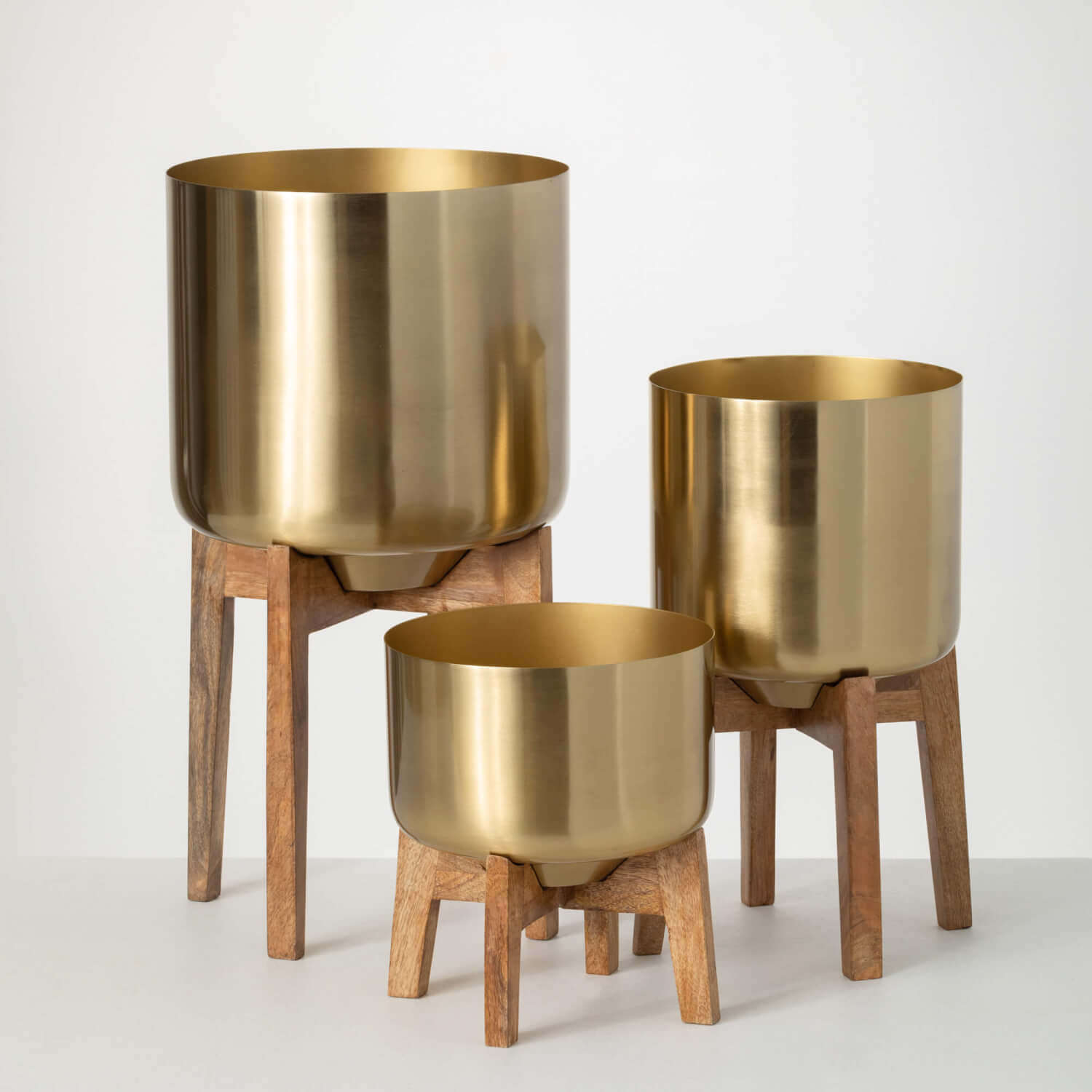 BRASS PLANTER TRIO ON STANDS