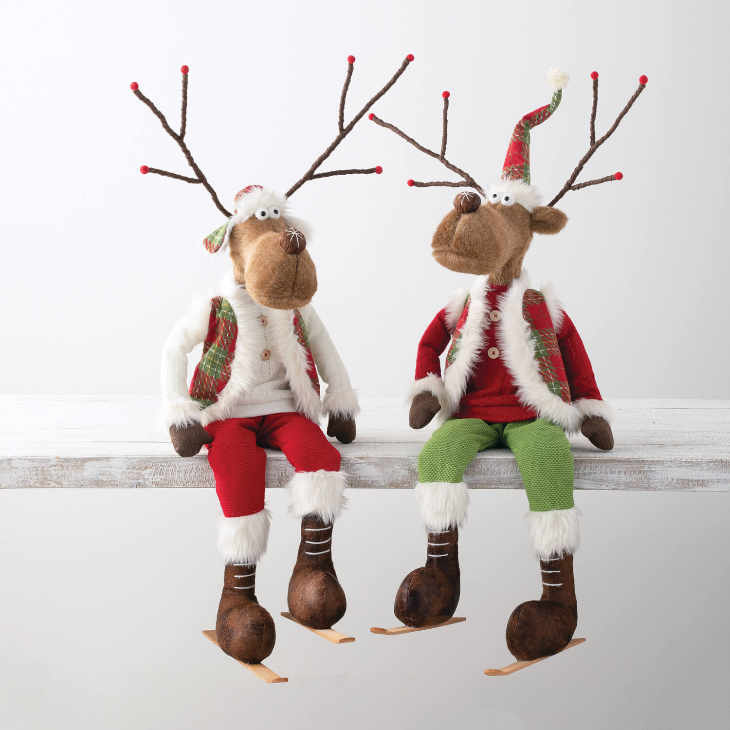 SITTING PLUSH REINDEER PAIR