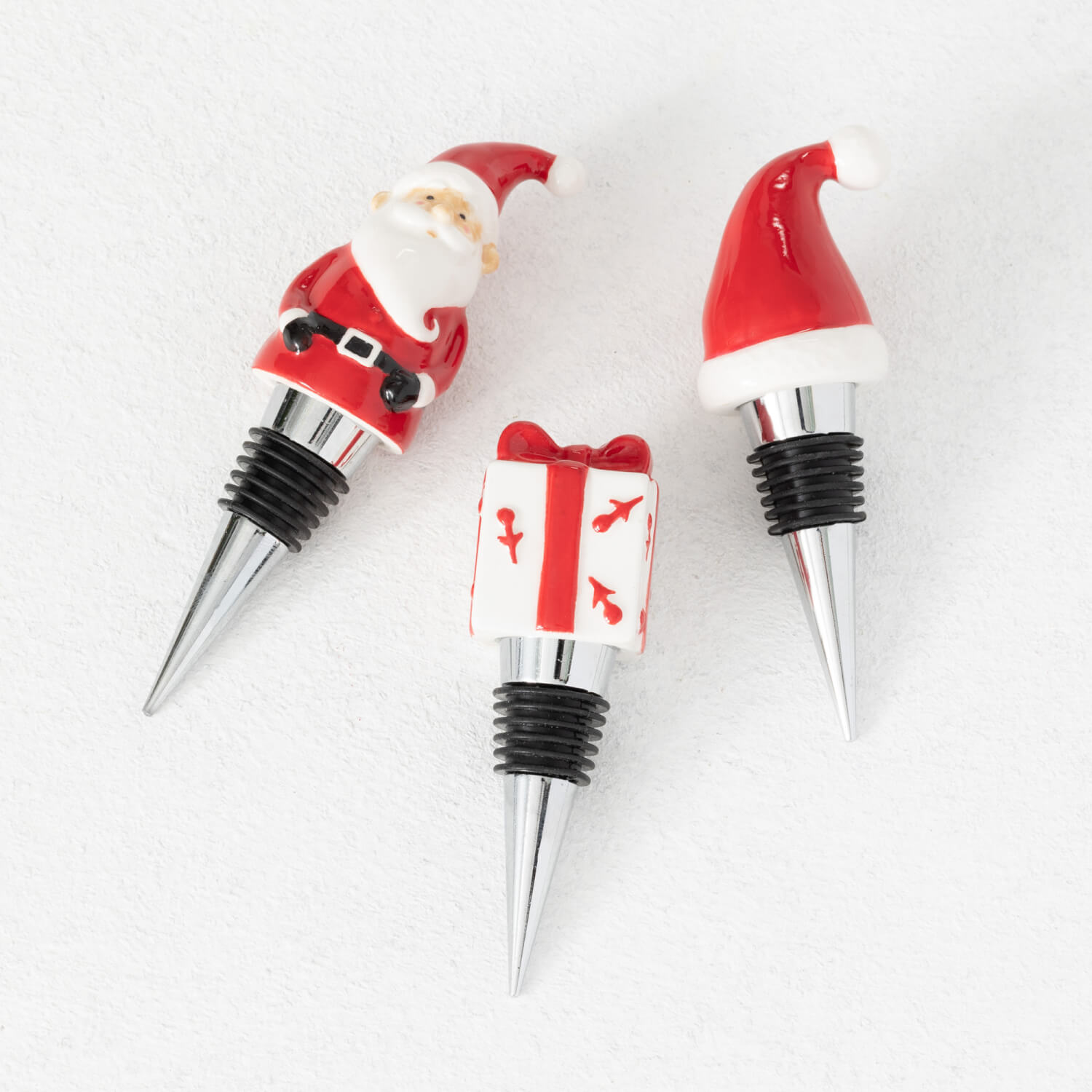 SANTA BOTTLE STOPPERS SET 3